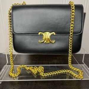 Gold and black cross body bag